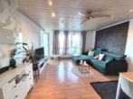 Wohnzimmer - Stylische 3-Zimmer-Wohnung mit Balkon – modernes Investment mit Zukunft!