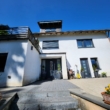 Frontansicht - Design trifft Raum – Modernisiertes Domizil mit Einliegerwohnung
