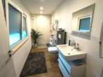 Duschbad EG - Design-Stadtvilla der Extraklasse – Luxusambiente, Wellness-Sauna & A+ Energieeffizienz