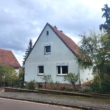 Straßenanicht - Einfamilienhaus mit Weitblick, neuem Heizsystem und schönem Gartenbereich – ideal zum Neugestalten