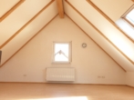 Dachstudio - Attraktives, vermietetes Reihenendhaus mit Garage und kleinem Grundstück – rentable Kapitalanlage