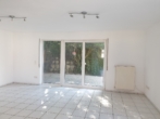 Wohnzimmerbeispiel - Attraktives, vermietetes Reihenendhaus mit Garage und kleinem Grundstück – rentable Kapitalanlage