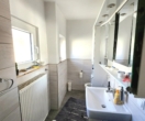 Badezimmer EG - Naturnah & stadtnah: Familienfreundliches Einfamilienhaus in begehrter Lage von Erfenbach