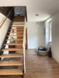 Eingangsbereich und Zugang zum 2 OG - Kernsaniertes Einfamilienhaus mit modernem Look und traumhaftem Garten in Weidenthal