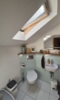 Gäste WC - Helle 4,5 Zimmer Dachgeschosswohnung mit großem Grundstücksanteil und Carport in Südhessen